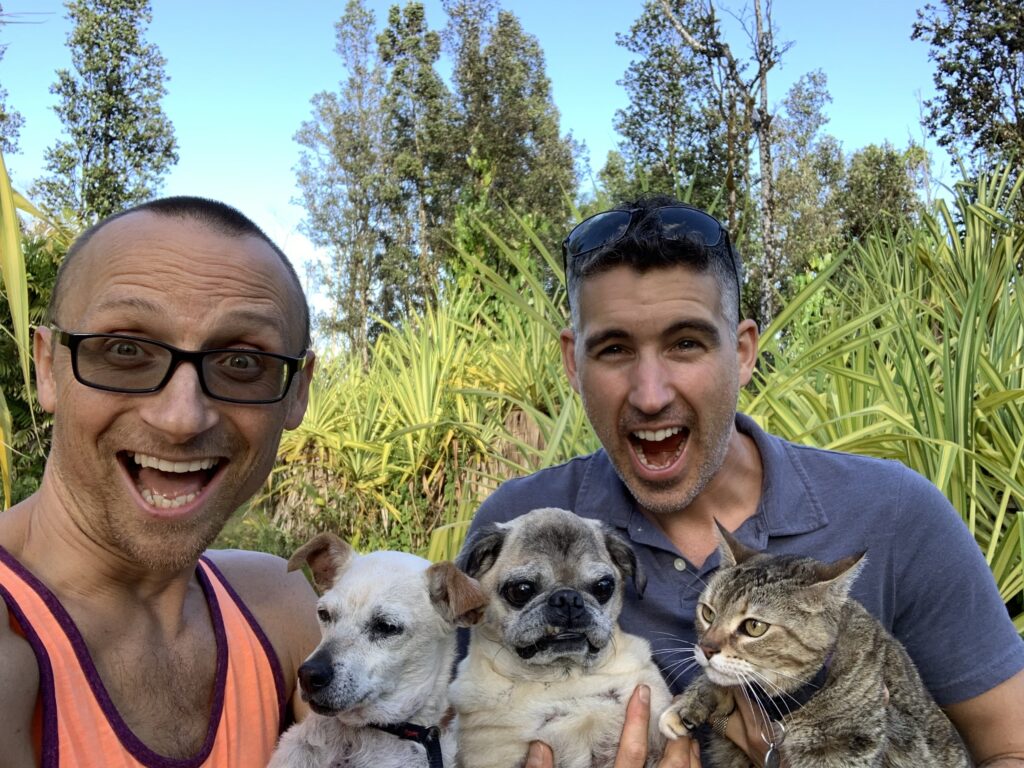 First day on our land, huge excited smiles from Seth and Lee with their two dogs and cat